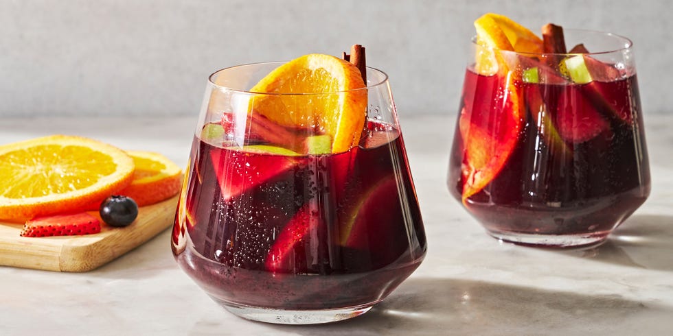 red sangria with fruit and cinnamon sticks