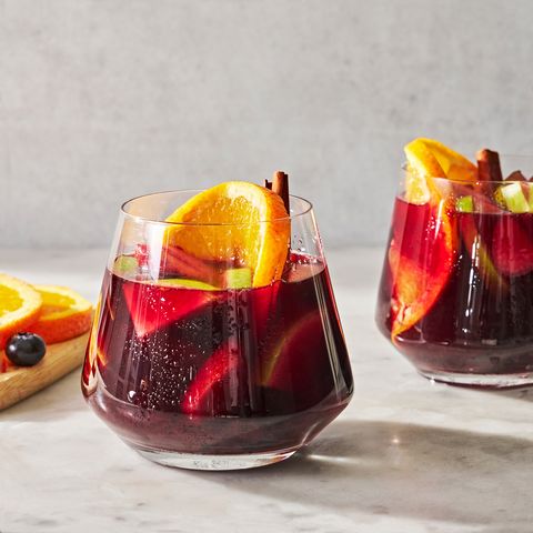 red sangria with fruit and cinnamon sticks