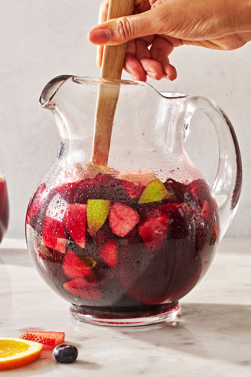 red sangria with fruit and cinnamon sticks