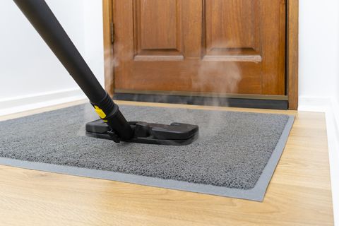spring cleaning tips clean doormat