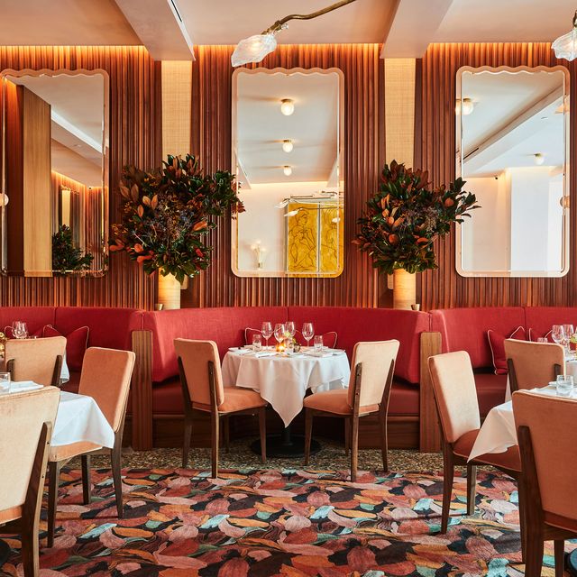 red banquettes and velvet chairs in sant ambroeus brookfield place