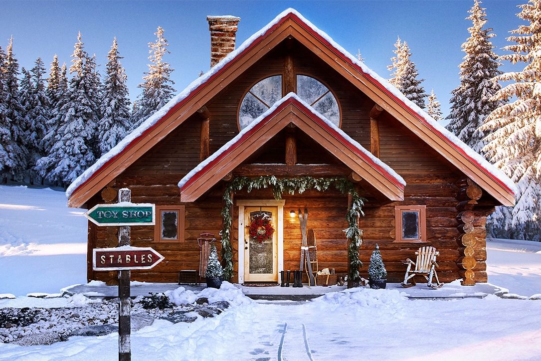 santa claus log cabin in snowy north pole setting with sign pointing to top shop and stables