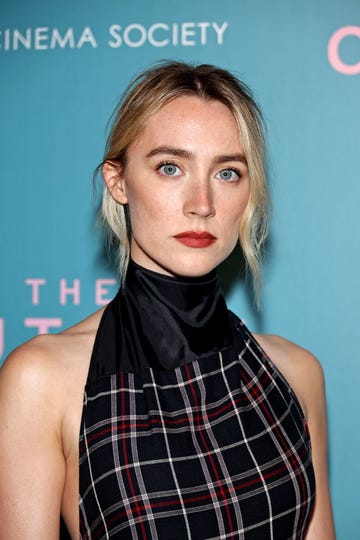 saoirse ronan wears red lipstick at a cinema event