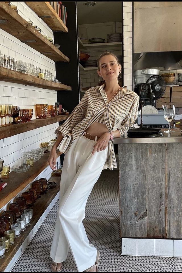 sara foster wears a pair of the favorite daughter favorite pants in a favorite pant review 2022
