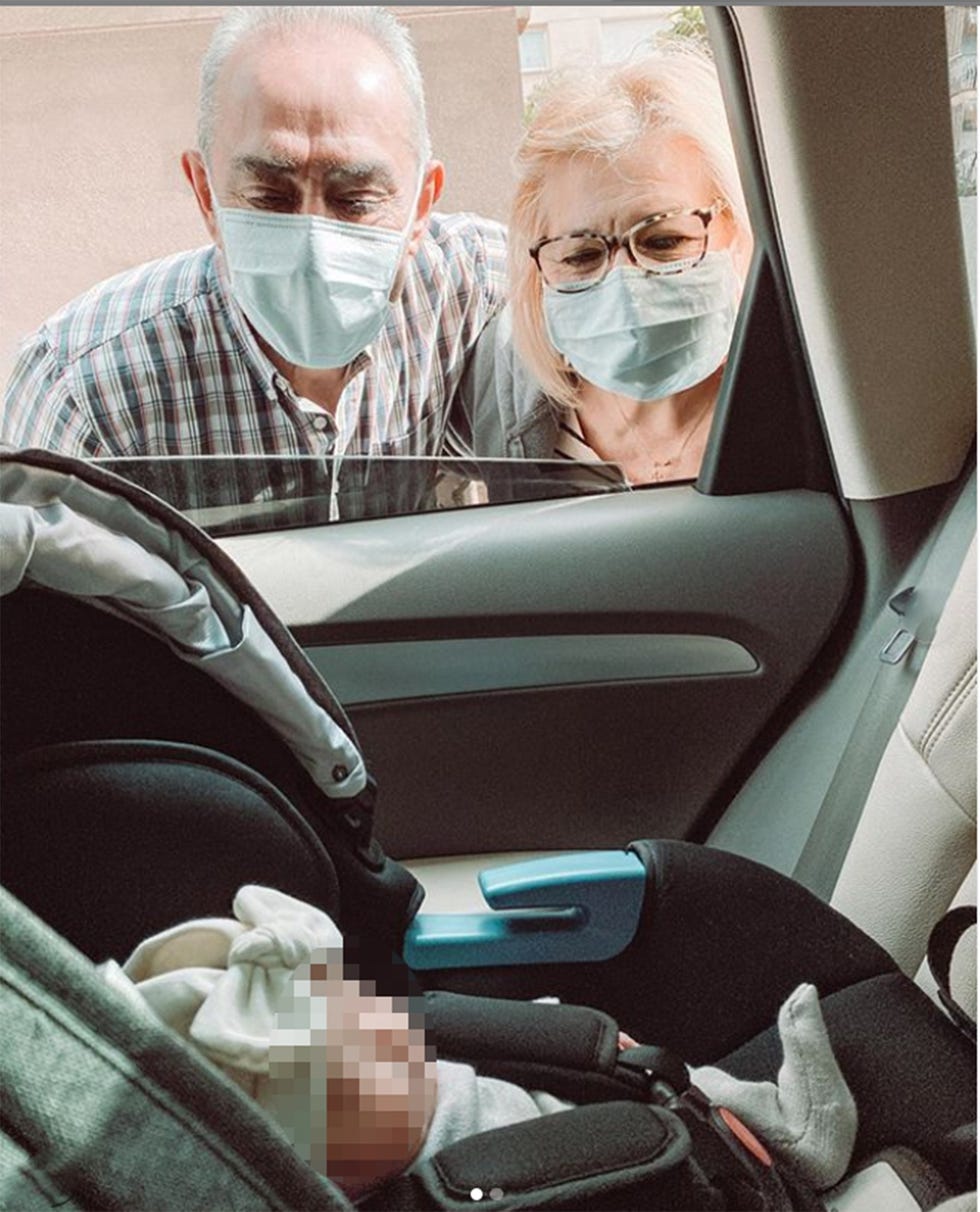 Head, Vehicle, Car, Glasses, Auto part, Mouth, Vehicle door, Seat belt, Photography, Eyewear, 