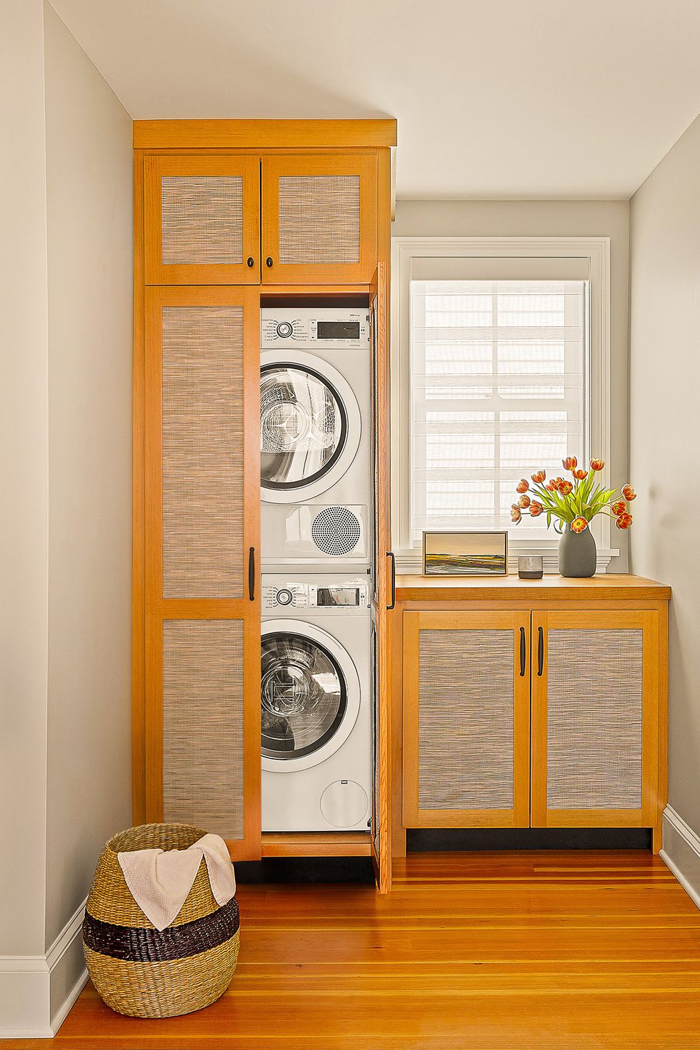 washer and dryer hidden in a cabinet