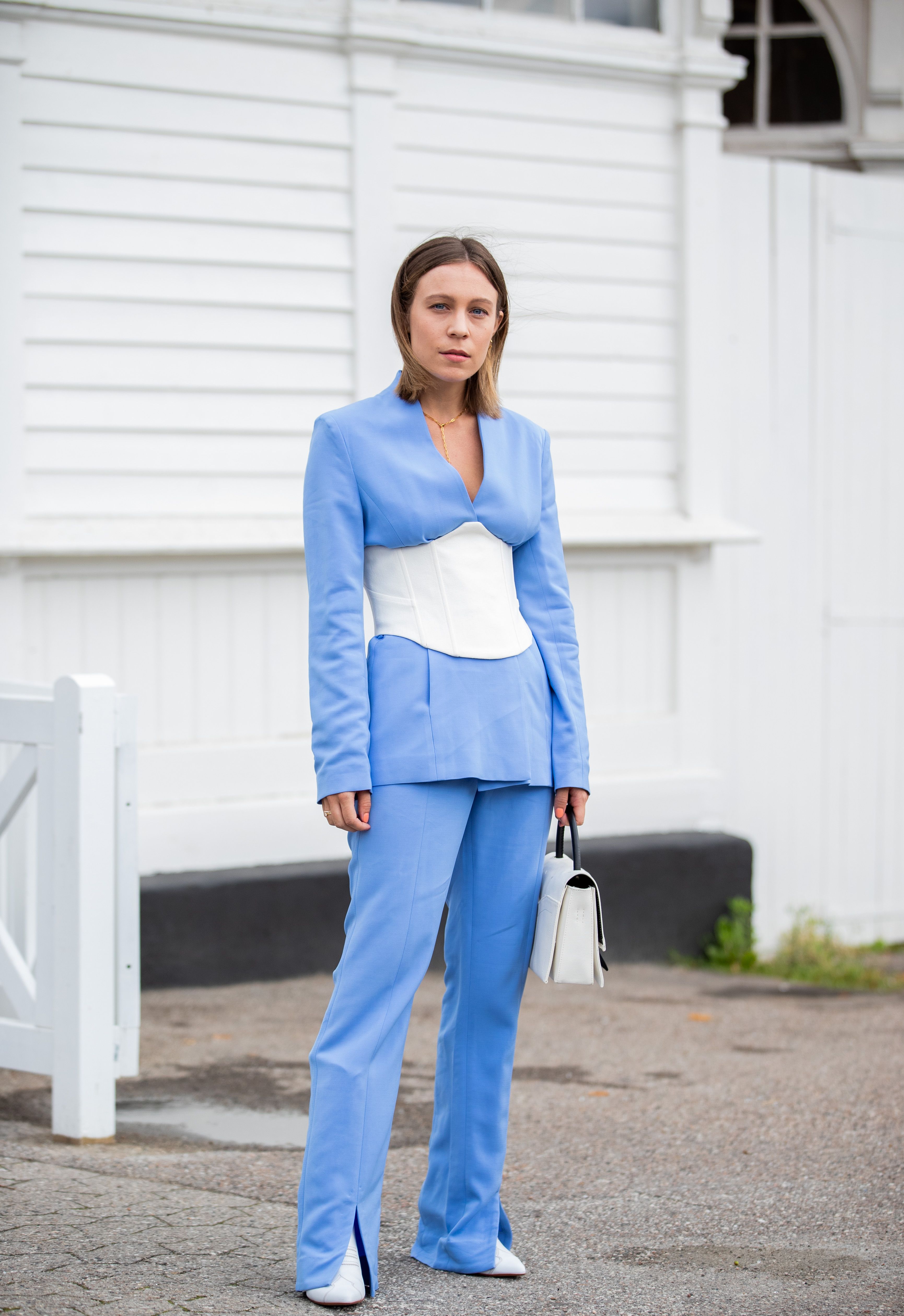 Street Style: The Latest News and Photos  Blue pants outfit, Blue trousers  outfit, Light blue pants