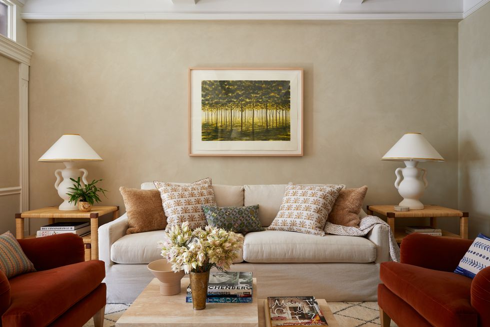 living room with beige couch and symmetrical lamps