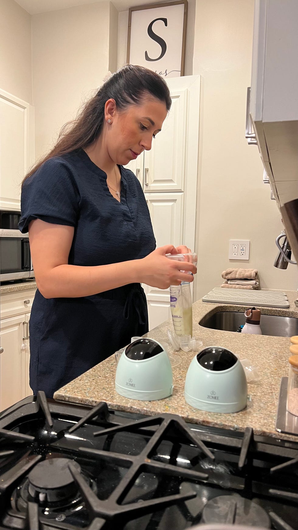 sassos testing wearable breast pumps in her home