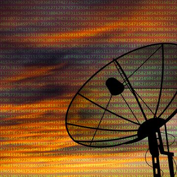 satellite dish on the background of a digital code satellite communication concept