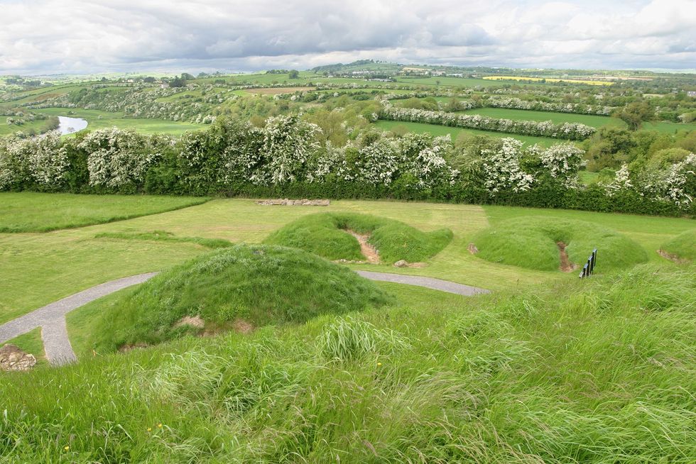 Grassy fields surround burial mounds near Knowth a UNESCO World Heritage site just outside Dublin Ireland