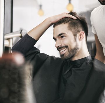 Satisfied customer at hairdresser