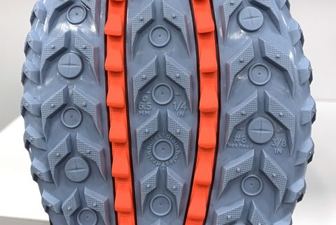 Tire, Automotive tire, Orange, Auto part, Rim, Automotive wheel system, Bicycle tire, Wheel, Tread, Synthetic rubber, 