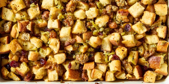 sausage stuffing in a white casserole dish
