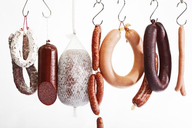 Sausages hanging on hooks