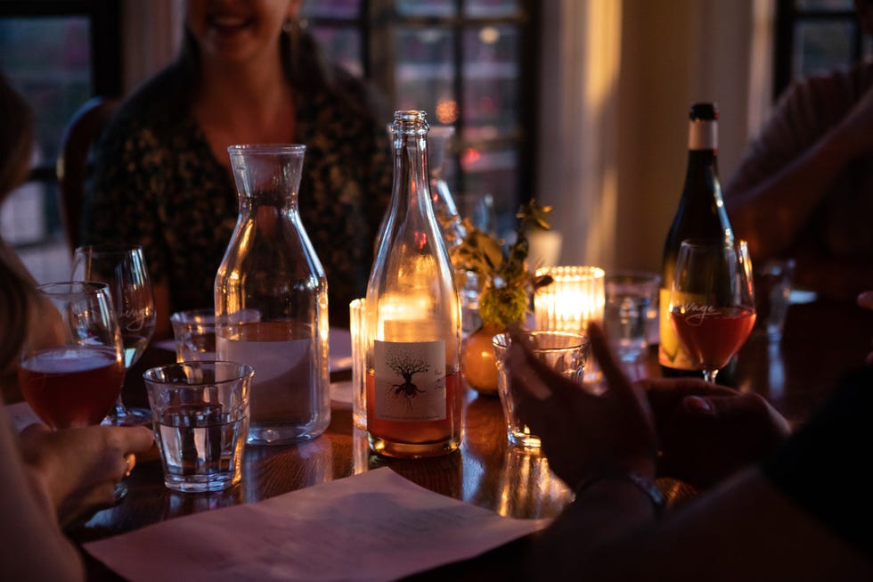 a table with bottles and glasses