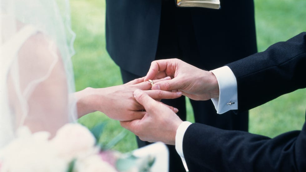 a group of people holding hands