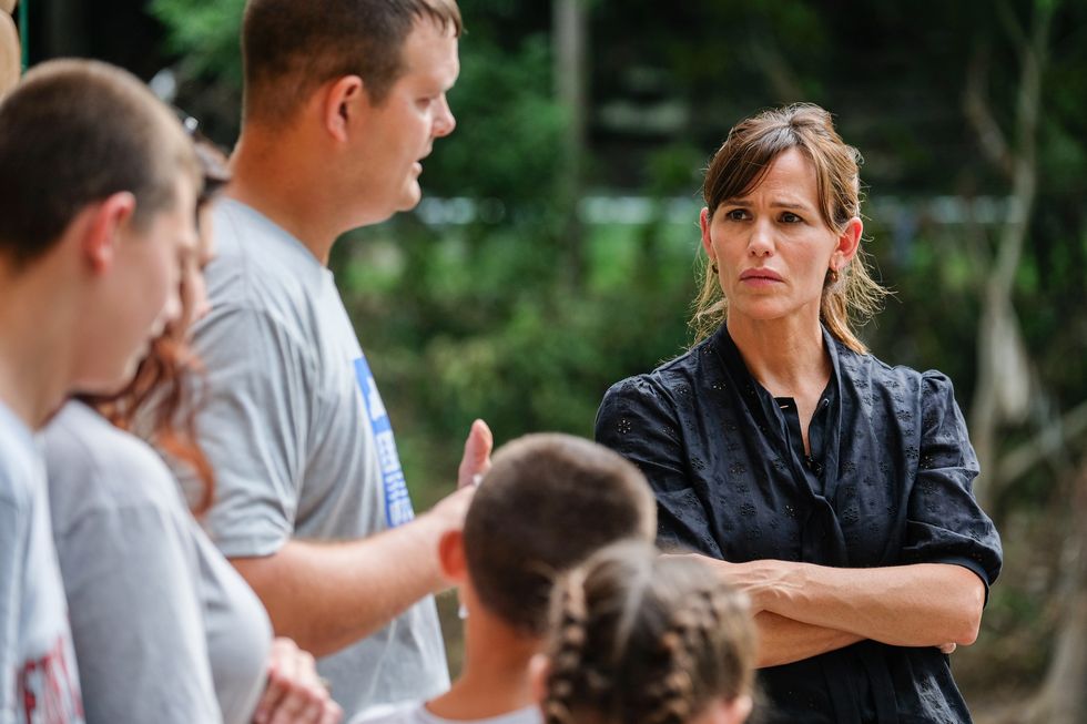 actor and save the children trustee jennifer garner, right, speaks to a family impacted by the flooding in east perry county on sunday, august 7th during her visit to kentucky to help children and families impacted by the flooding