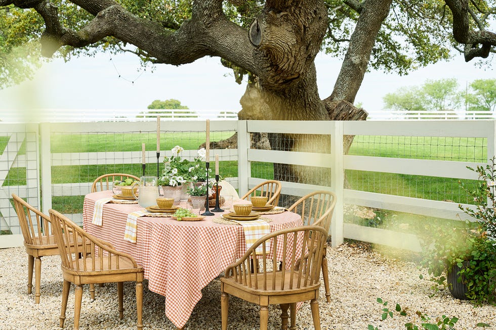 outdoor dining table on pebbles