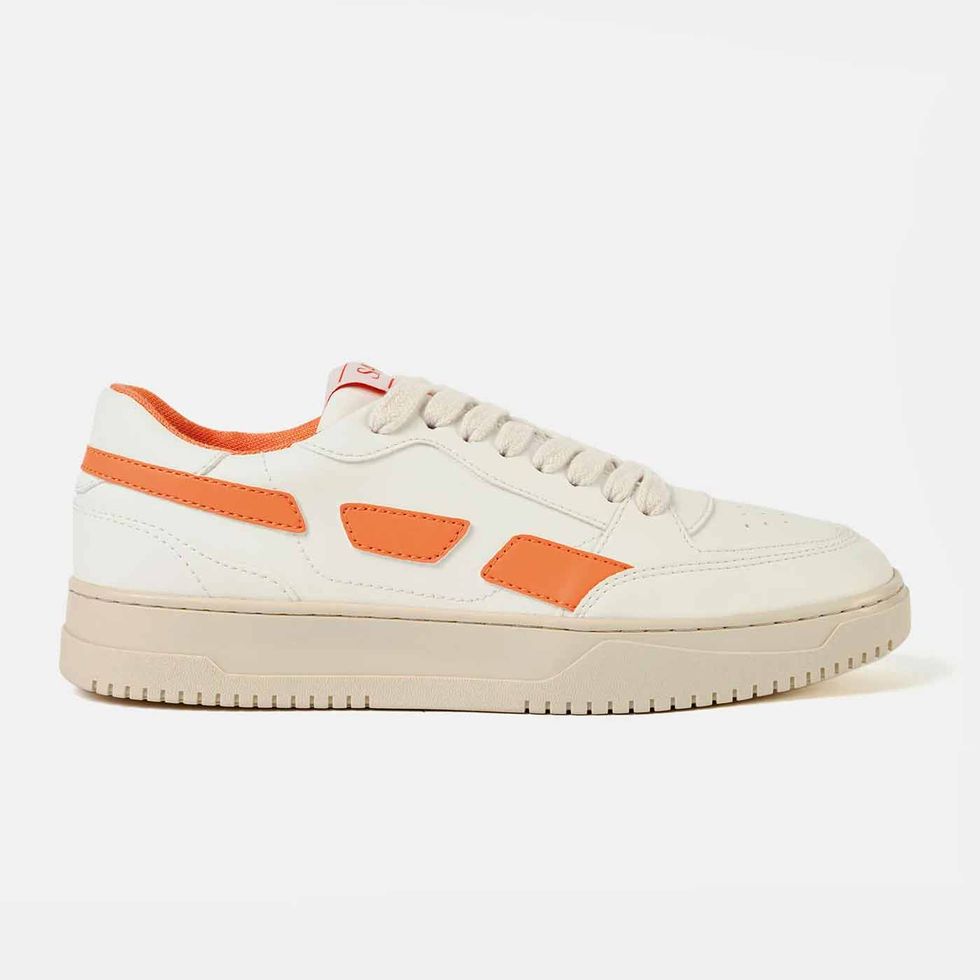 a white and orange shoe