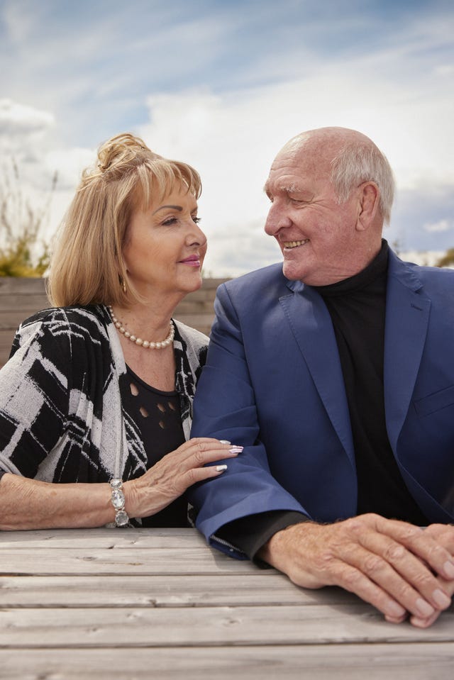 older couple looking at each other lovingly