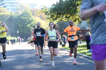 runners participating in a marathon on a sunny day