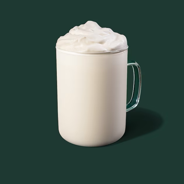 a white mug with a white substance