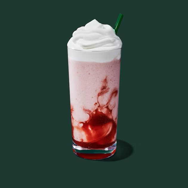 a glass with a drink in it