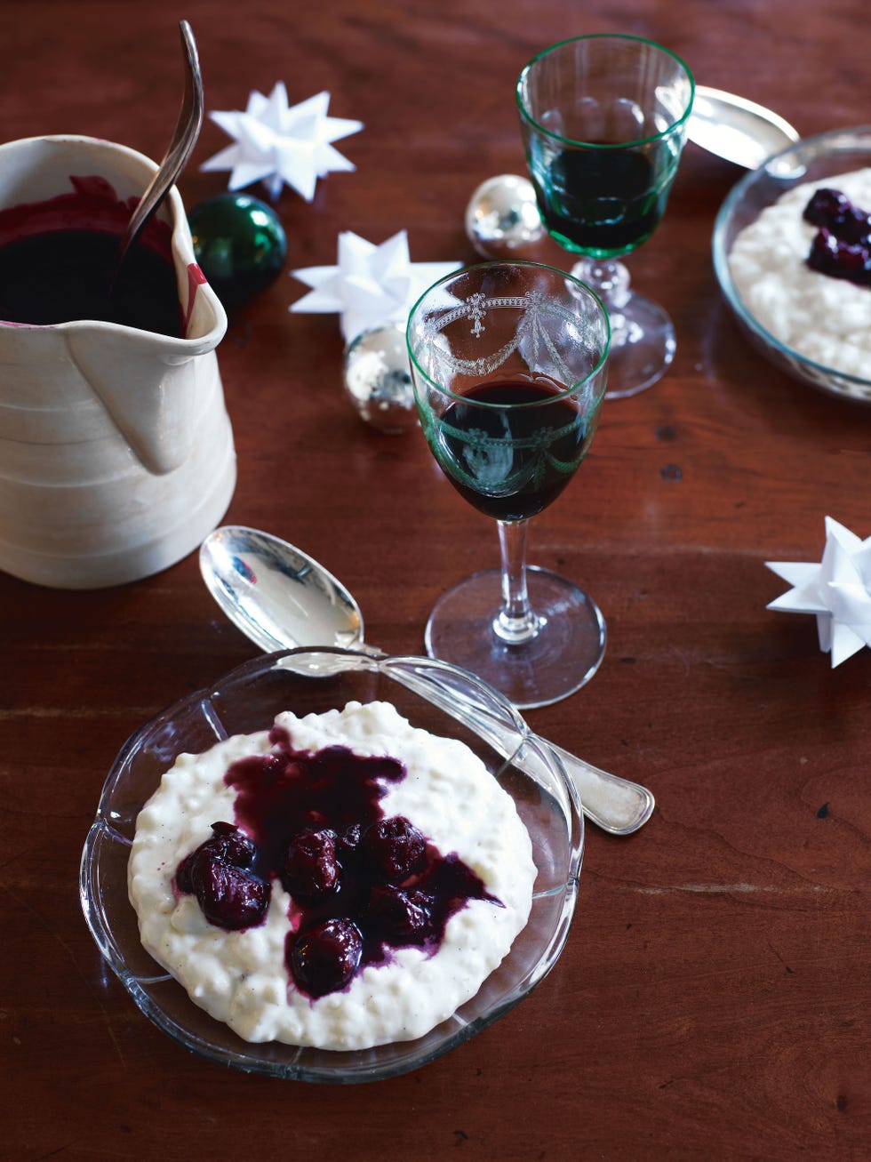 https://hips.hearstapps.com/hmg-prod/images/scandinavian-comfort-food-cold-rice-pudding-with-warm-cherry-sauce-1515105507.jpg?crop=1xw:1xh;center,top&resize=980:*