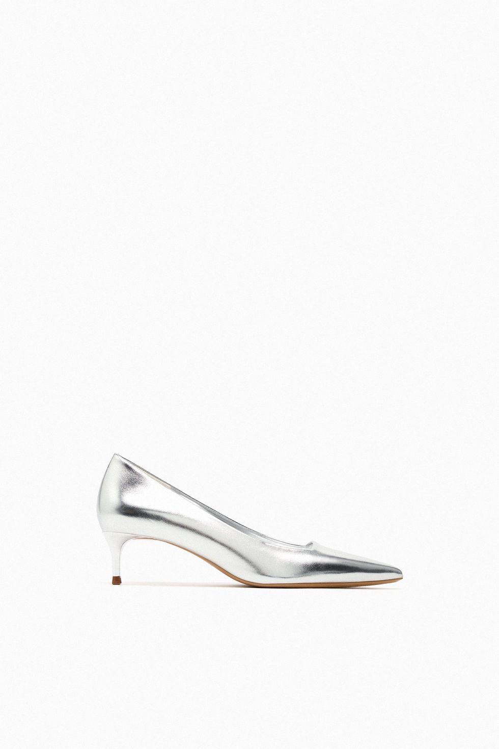 a white and gold shoe