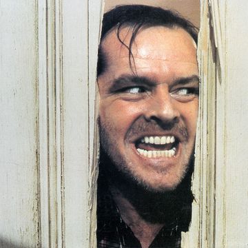 jack nicholson peering through axed in door in lobby card for the film the shining, 1980 photo by warner brothersgetty images