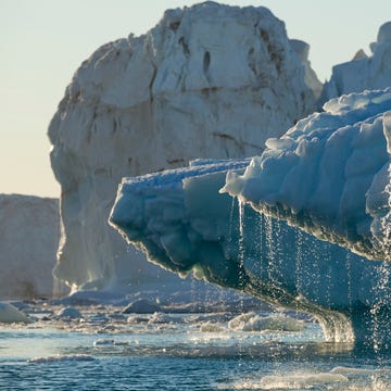 scenic view of frozen sea against sky