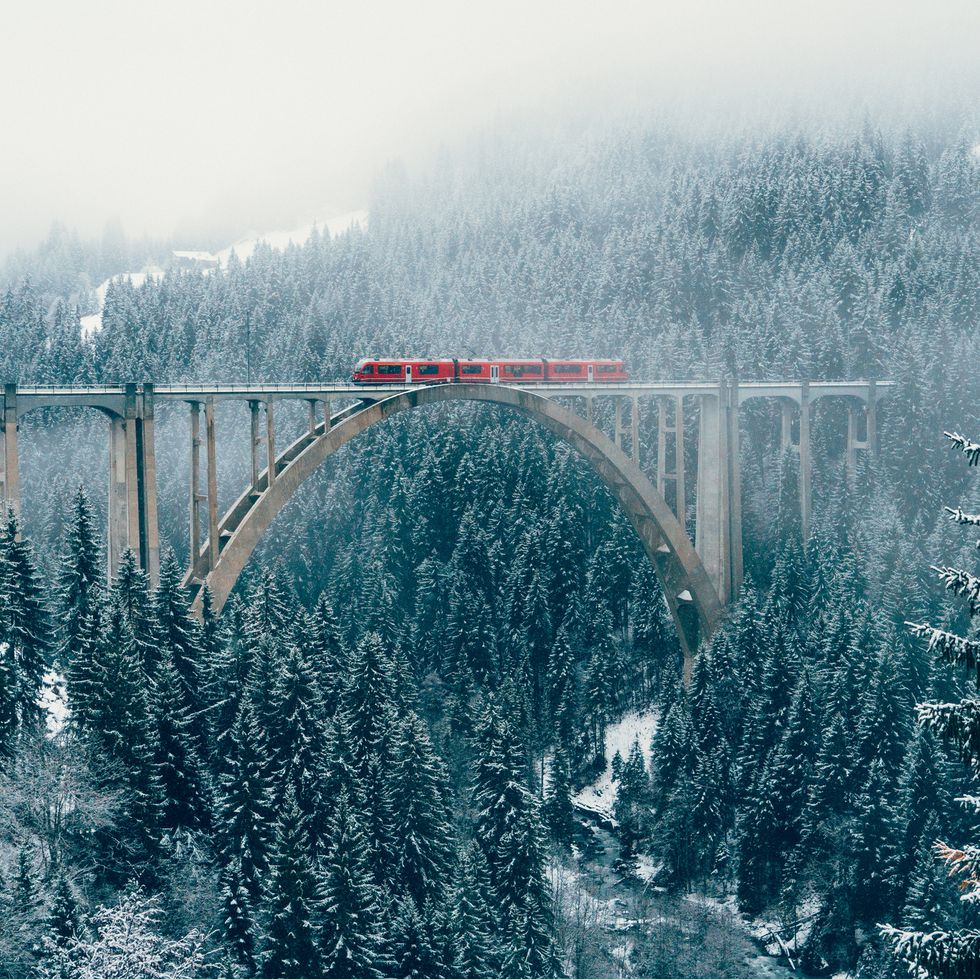 Scenic view of train on viaduct in Switzerland