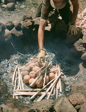 a person standing in a bucket of water