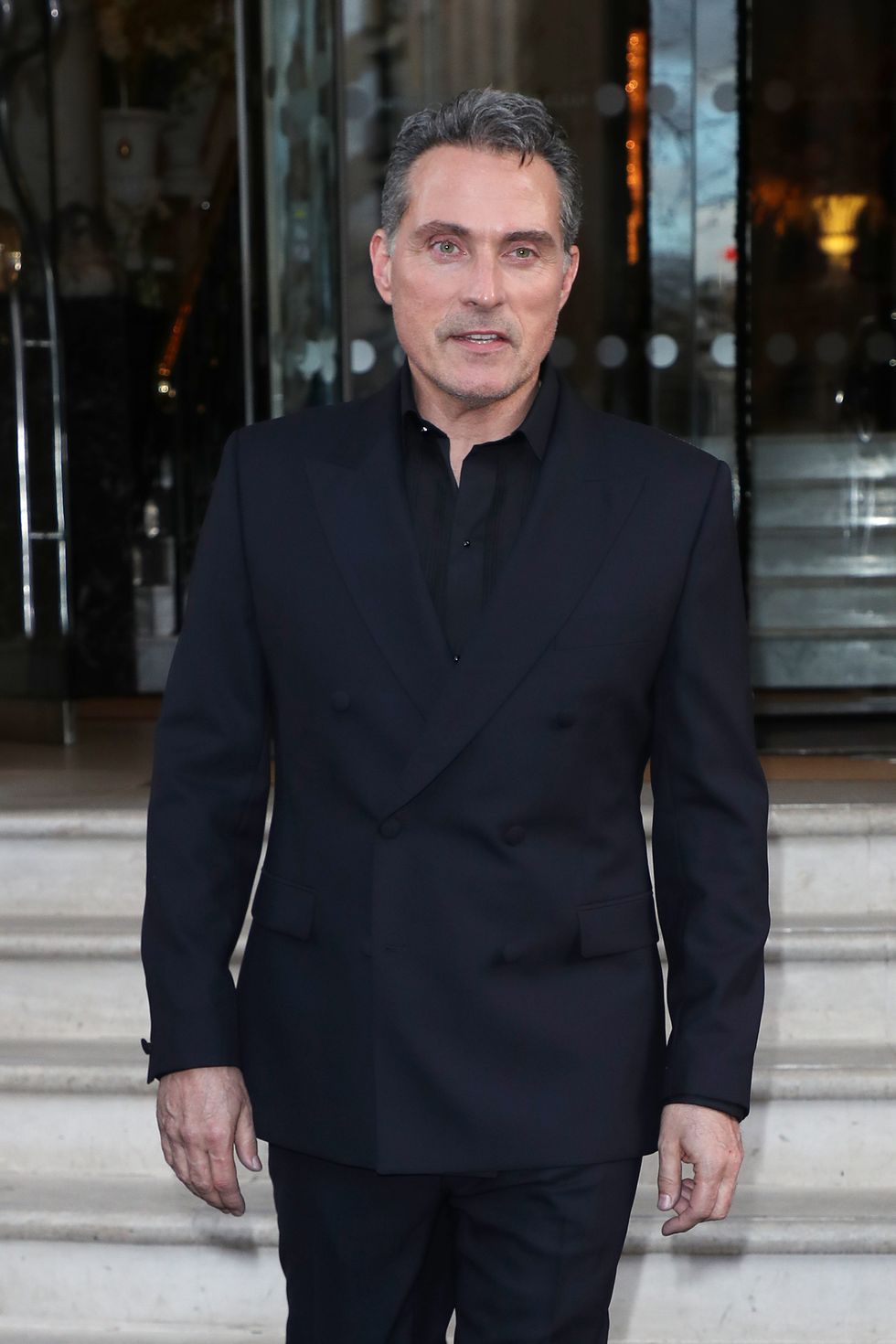 rufus sewell leaving his hotel ahead of the premiere for new netflix film scoop