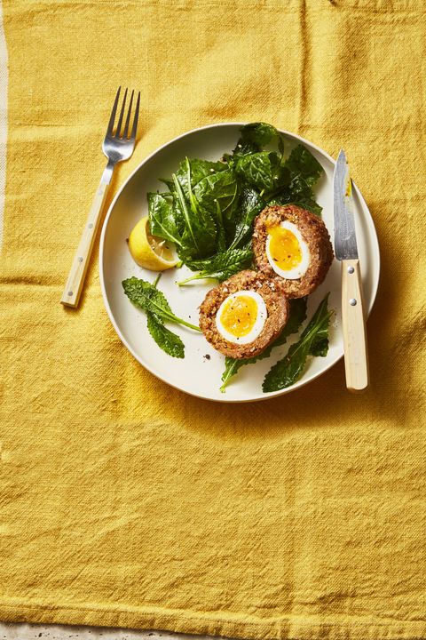 beef scotch eggs with a green salad on the side