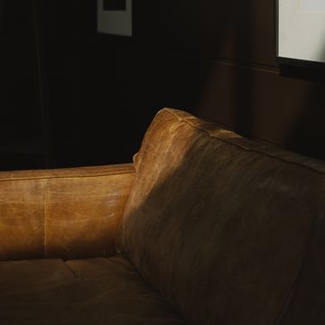 a couch in a dark room