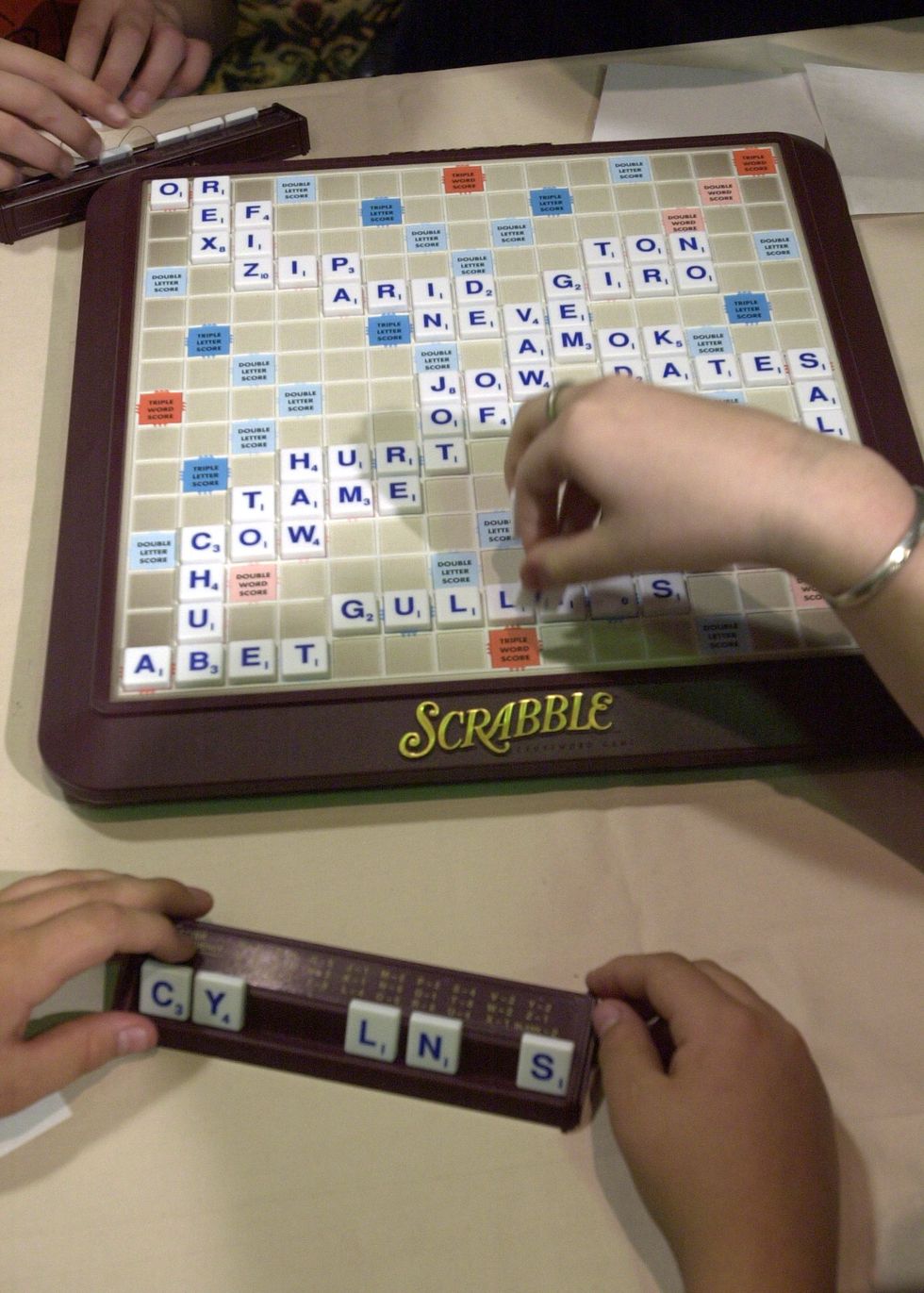 How to Play Scrabble: Word Game Rules (Plus Easy Tricks!)