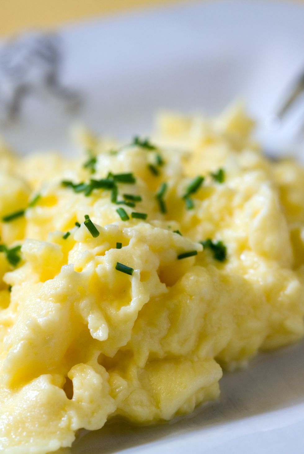Close-up of a plate of fluffy scrambled eggs