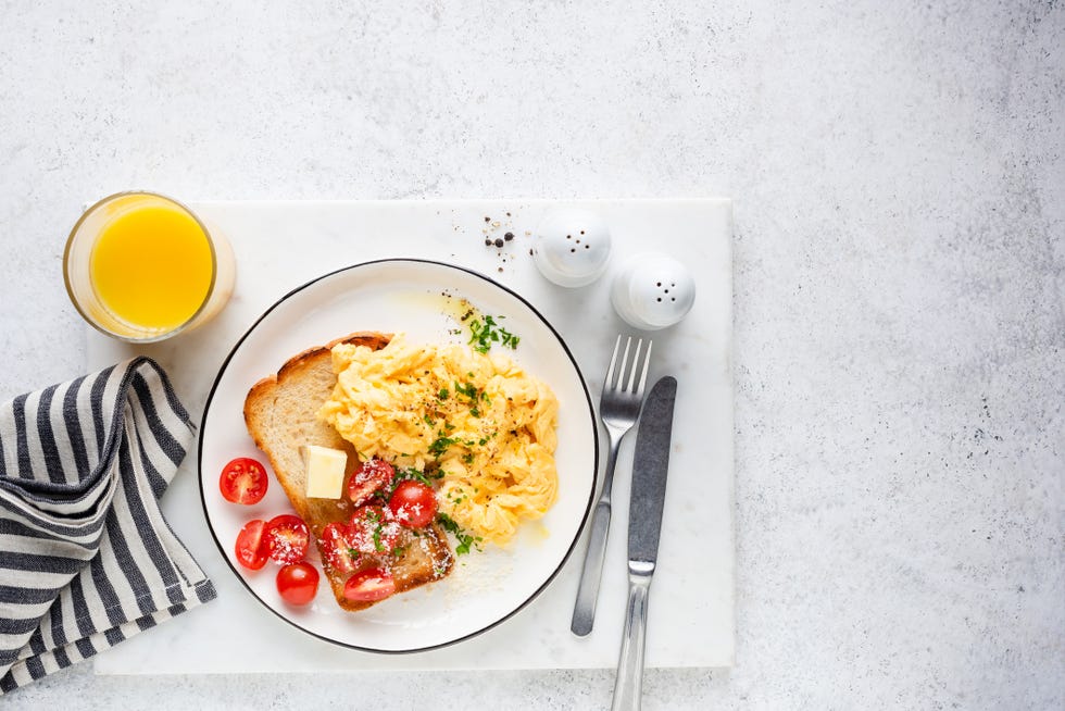 scrambled eggs with toast and orange juice