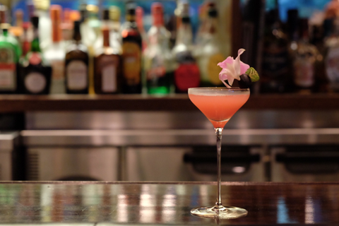 cocktail with flower garnish