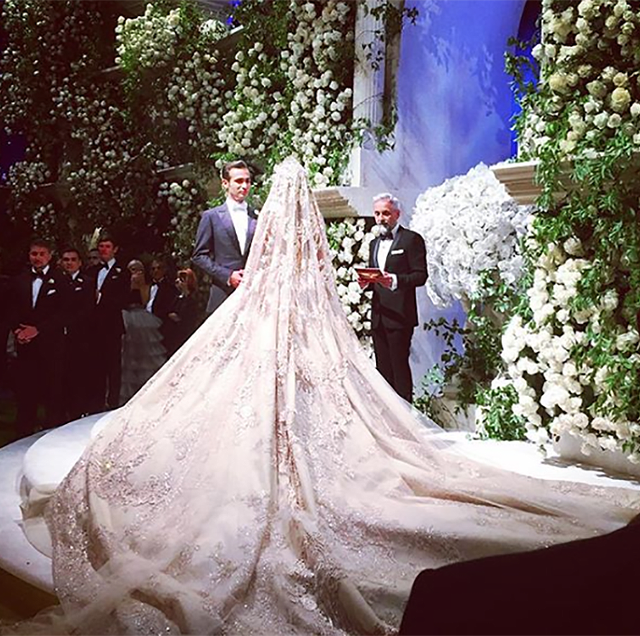 Bridal clothing, Photograph, Bridal veil, Veil, Petal, Gown, Wedding dress, Tradition, Bride, Dress, 