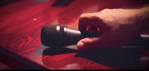Microphone, Audio equipment, Red, Light, Lighting, Close-up, Photography, Technology, Finger, Electronic device, 