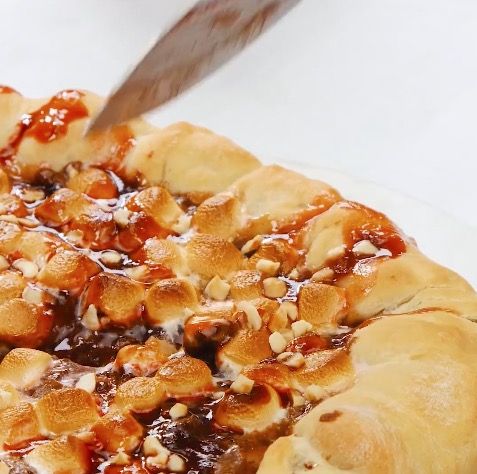 Wait until you see the chocolate ooze out of this dessert pizza crust 