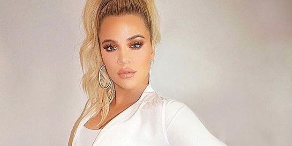 Khloe Kardashian hits back at bump-shamers as she's criticised for flying at 8 months pregnant