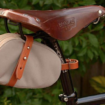 Bicycle saddle, Bicycle part, Horse tack, Saddle, Leather, 