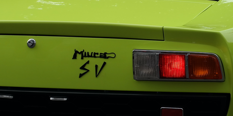 The 20 Coolest Car Badges Ever Made - Road & Track