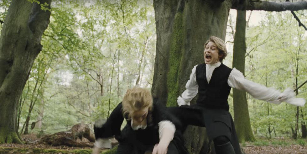 Joe Alwyn in his role as Baron Masham in "The Favourite" surprise-attacks Emma Stone, who plays Abigail Hill