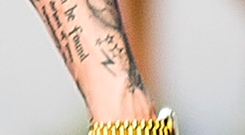 Tattoo, Skin, Temporary tattoo, Arm, Hand, Wrist, Joint, Finger, Font, Human leg, 
