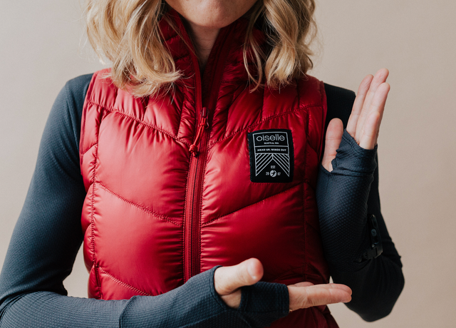 Red, Clothing, Outerwear, Jacket, Shoulder, Hoodie, Blond, Arm, Vest, Sleeve, 